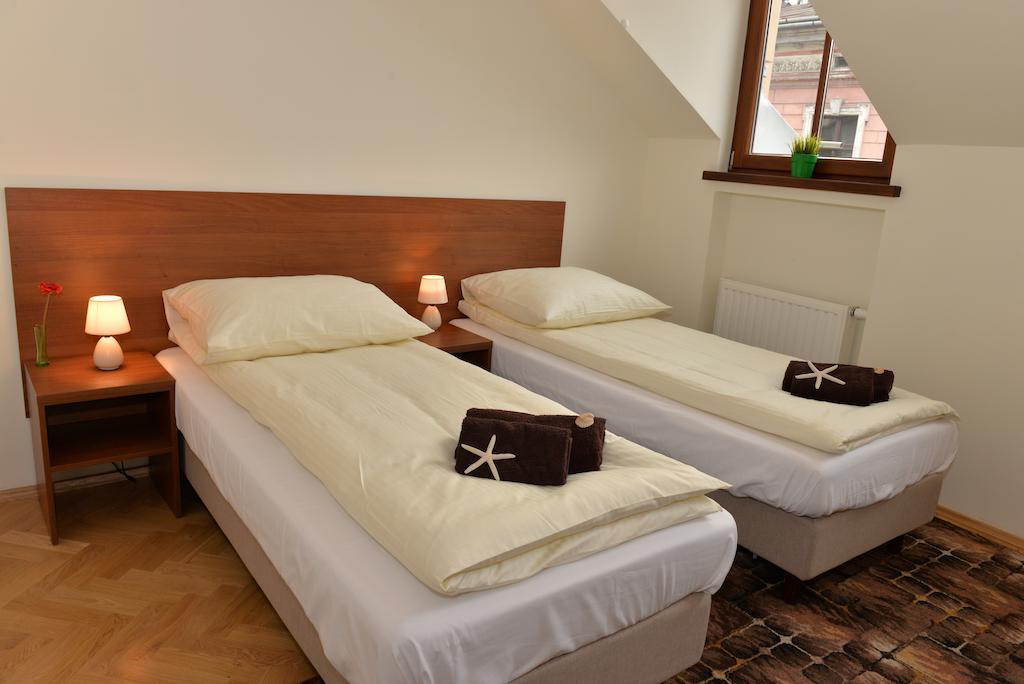 Royal Route 29 Comfort Rooms คราคูฟ ห้อง รูปภาพ